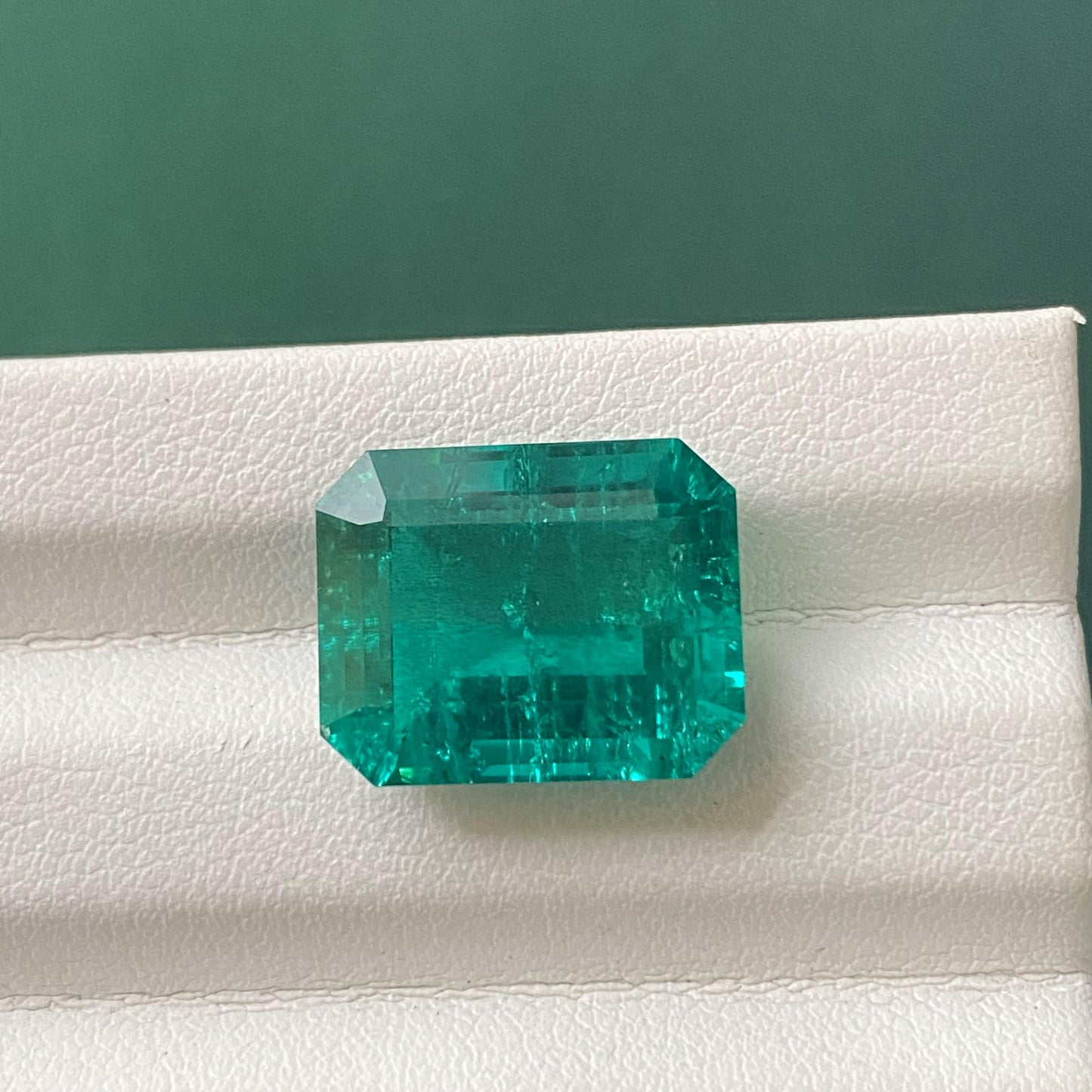Pirmiana 11.5ct Emerald Cut Lab Grown Emerald with nice inclushions like natural gems
