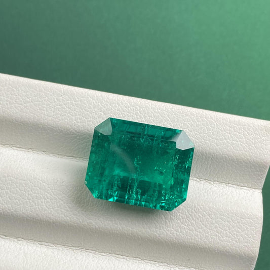 Pirmiana 11.5ct Emerald Cut Lab Grown Emerald with nice inclushions like natural gems